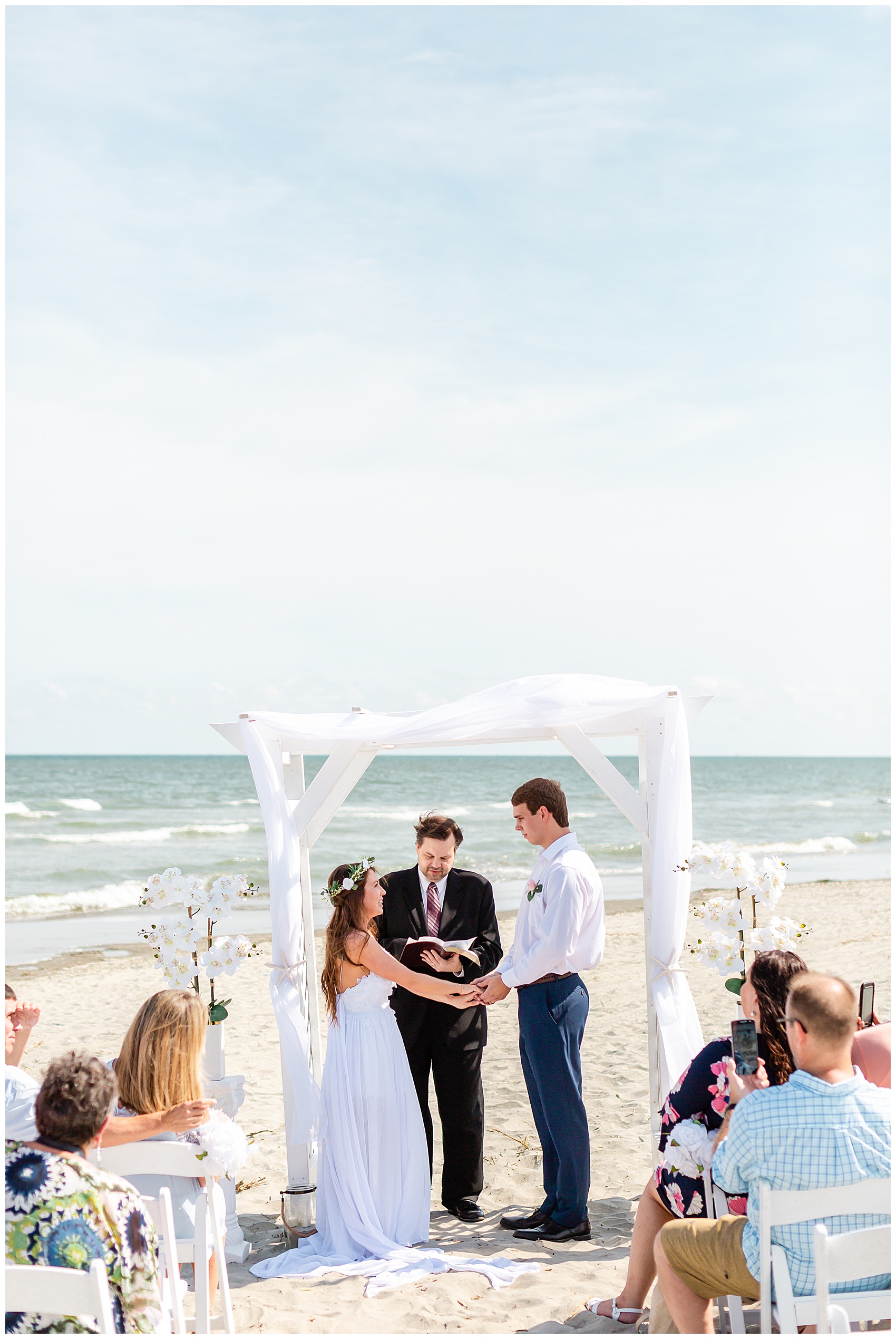 bride and groom getting married at the beach