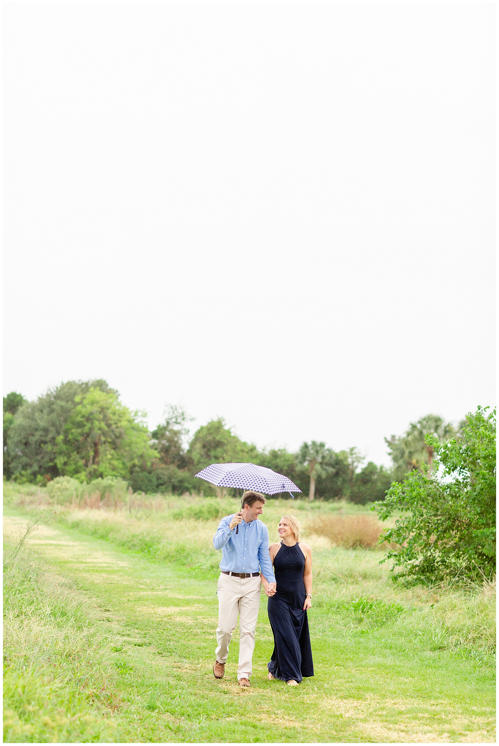 A Rainy Charleston Engagement umbrella engagement photos