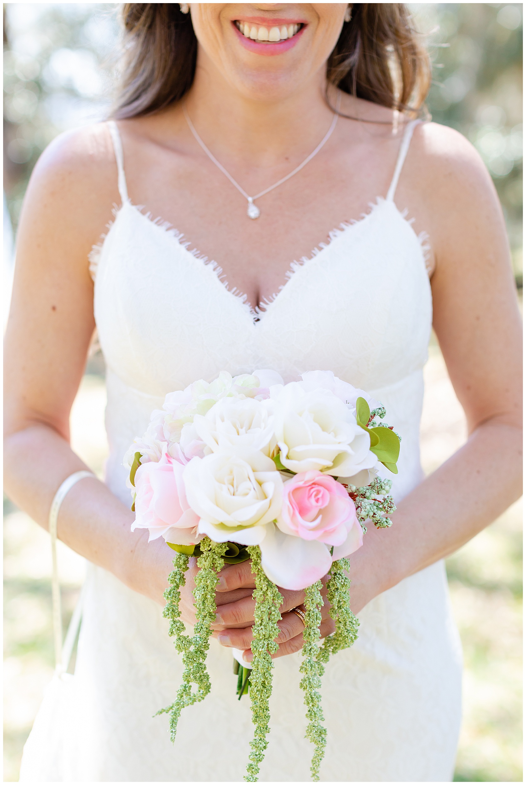 bride on her wedding day with her bouquet