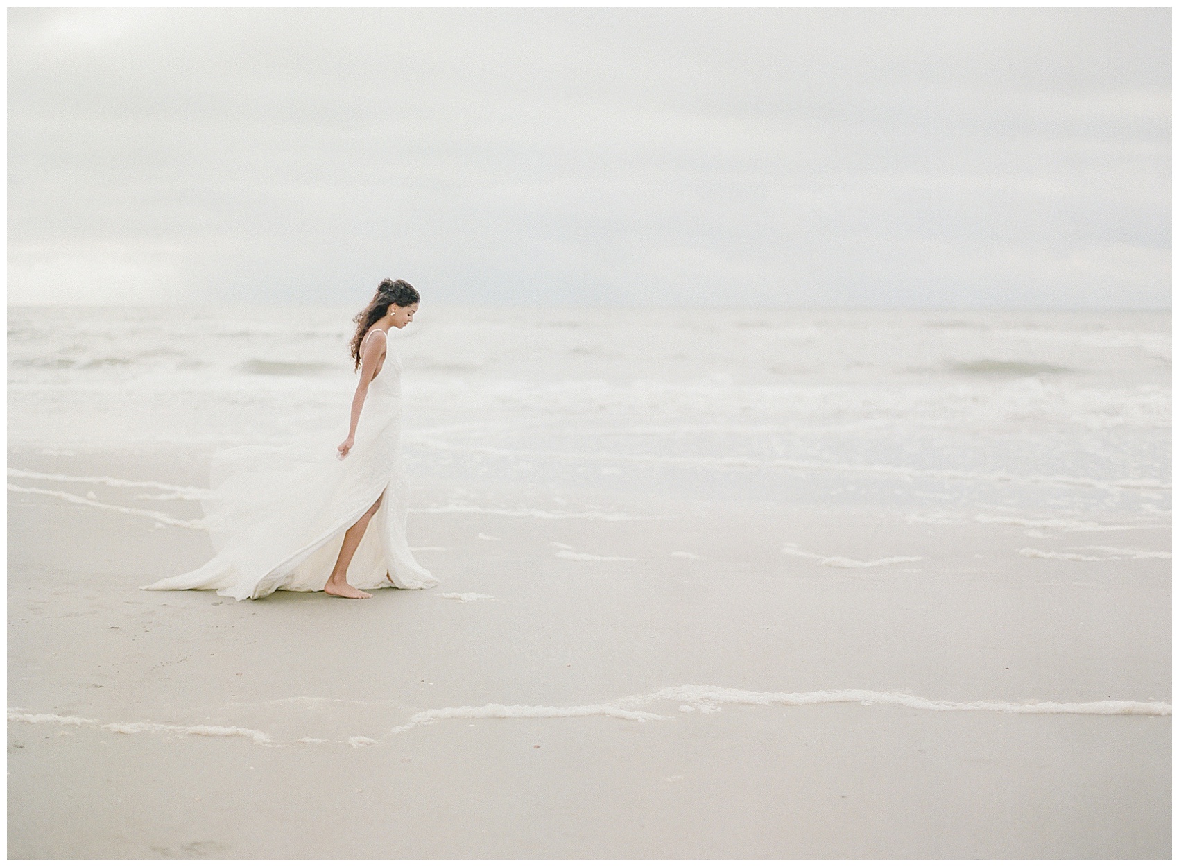 bride walking down Folly Beach