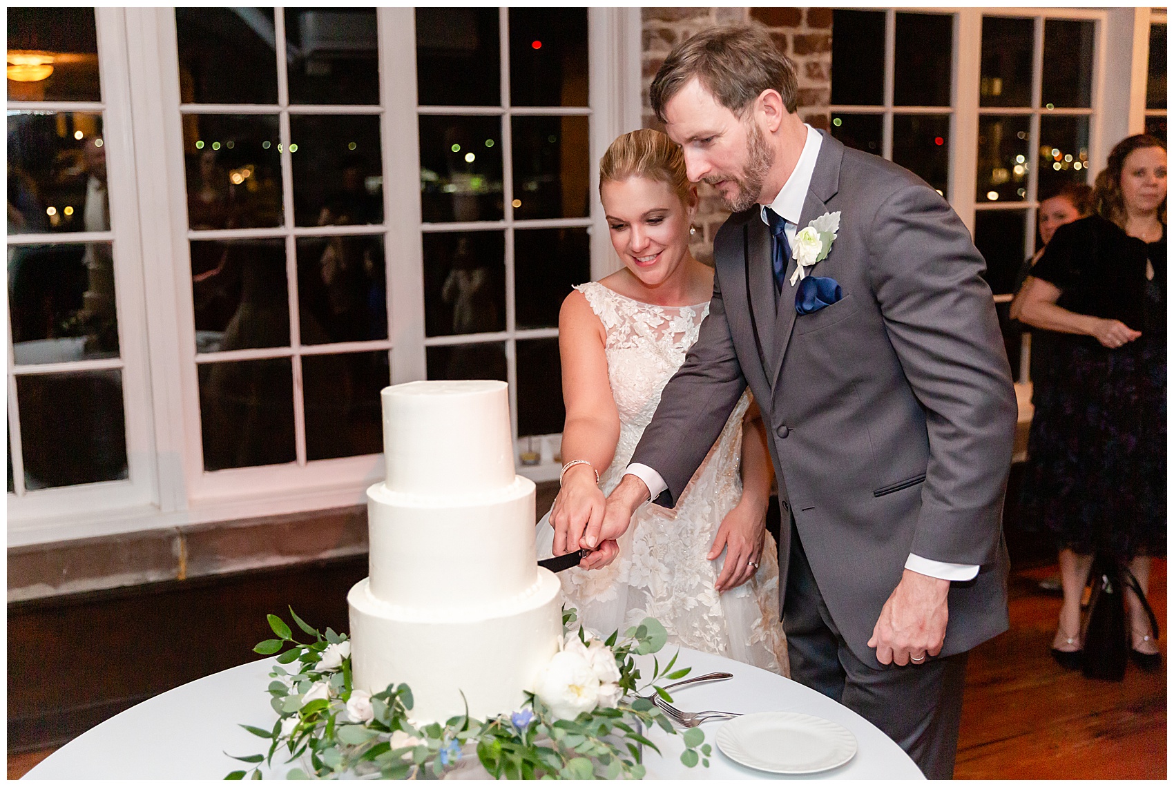 cake cutting at the Historic Rice Mill in downtown Charleston