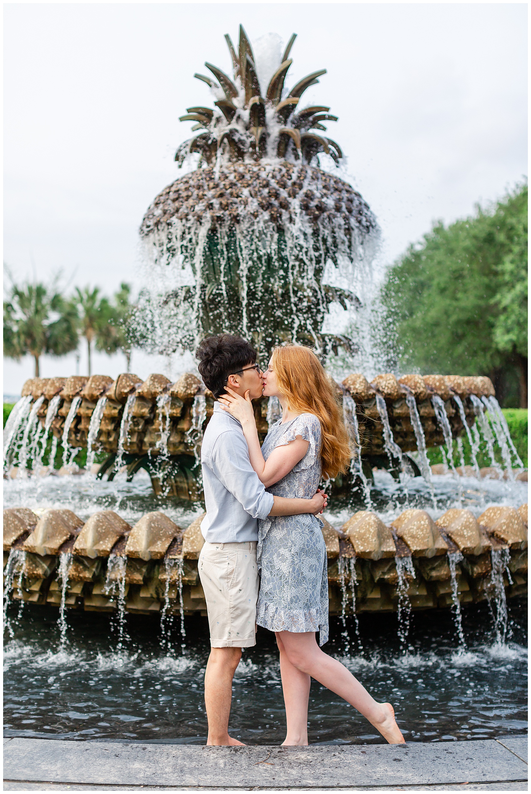 engagement session in Downtown Charleston the pineapple fountain