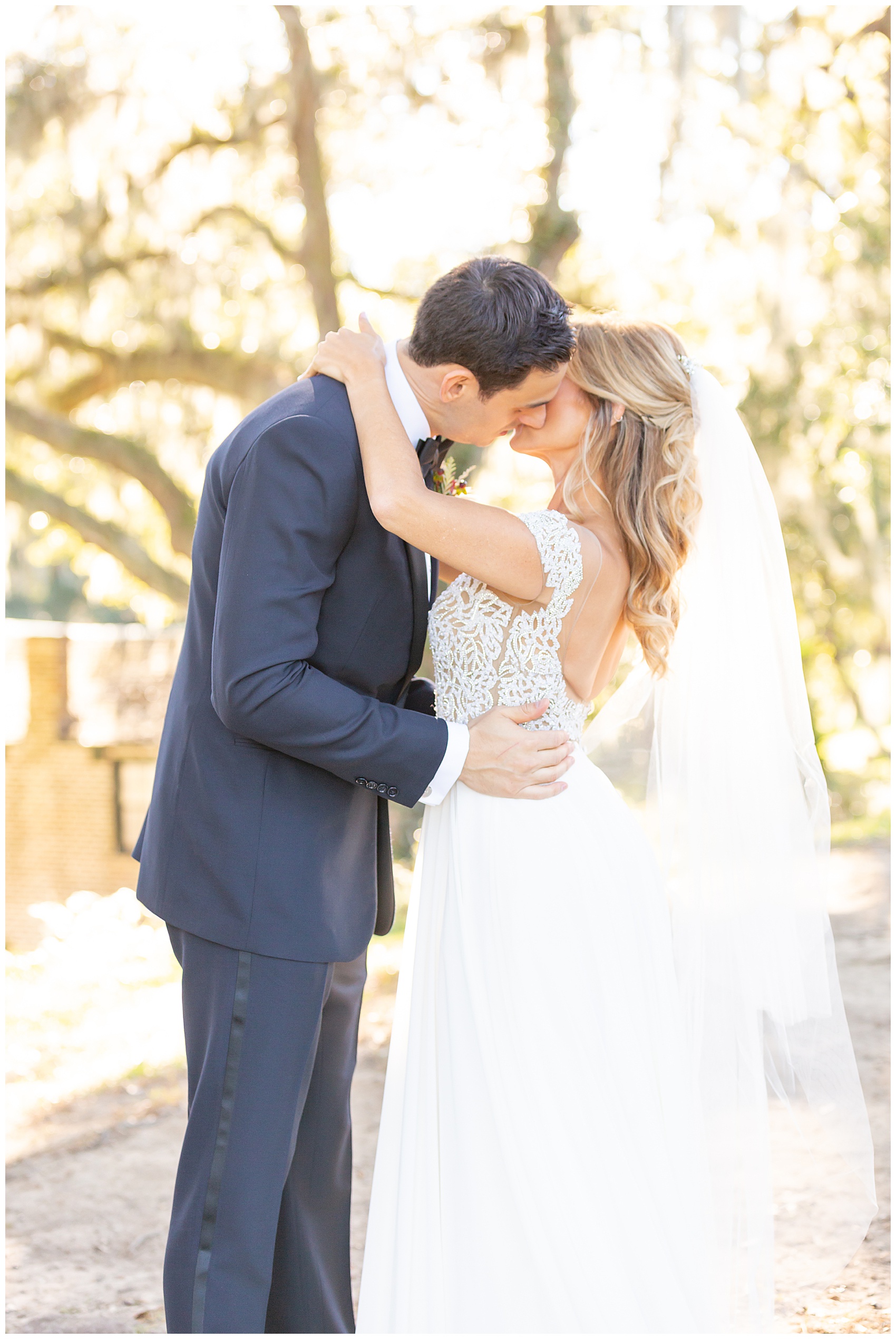 fall wedding at middleton place bride and groom share a kiss